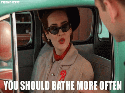 A Woman Sitting In A Car With The Words You Should Bathe More Often GIF