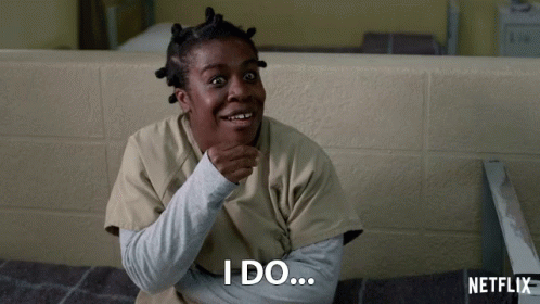 A Woman Sitting In A Chair With Netflix Written On The Bottom GIF