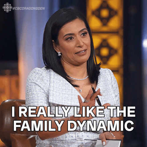 A Woman Sitting In A Chair With The Words I Really Like The Family Dynamic Behind Her GIF