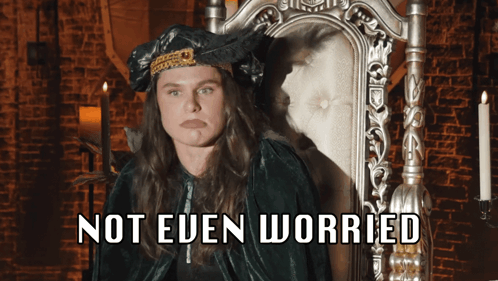 A Woman Sitting In A Chair With The Words " Not Even Worried " Written Below Her GIF