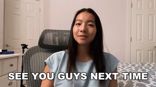 A Woman Sitting In A Chair With The Words See You Guys Next Time Written Below Her GIF