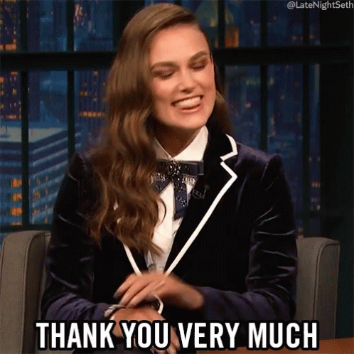 A Woman Sitting In A Chair With The Words Thank You Very Much Above Her GIF
