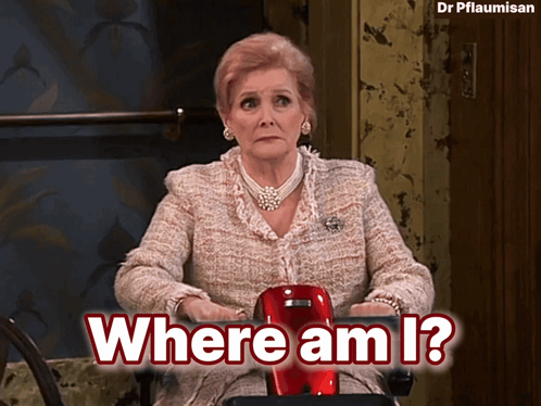a woman sitting in a chair with the words where am i written above her