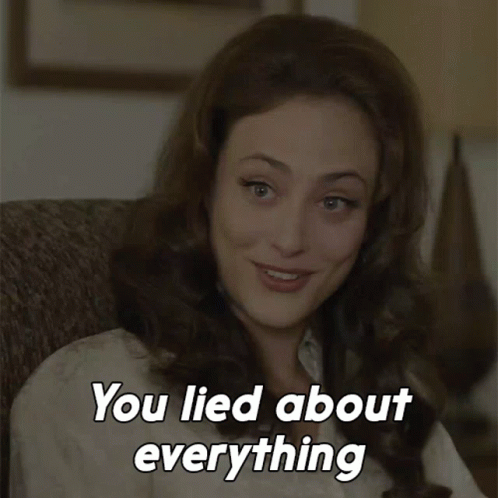 A Woman Sitting In A Chair With The Words " You Lied About Everything " On The Bottom GIF