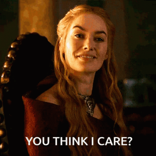 A Woman Sitting In A Chair With The Words " You Think I Care " On The Bottom GIF
