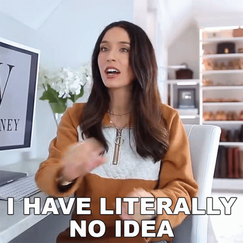 A Woman Sitting In Front Of A Computer With The Words I Have Literally No Idea GIF