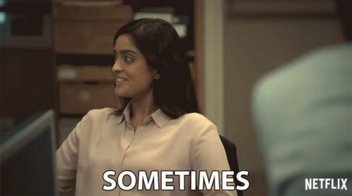 A Woman Sitting In Front Of A Computer With The Words Sometimes Written On Her Shirt GIF