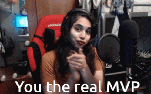 A Woman Sitting In Front Of A Microphone With The Caption You The Real Mvp GIF