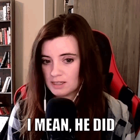 A Woman Sitting In Front Of A Microphone With The Words " I Mean He Did " On Her Face GIF