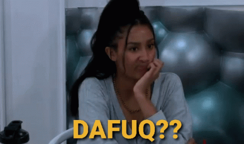 A Woman Sitting In Front Of A Wall With The Word Dafuq Written In Yellow GIF