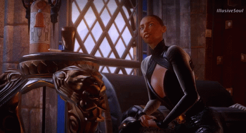 A Woman Sitting In Front Of A Window With Illusive Soul Written On The Bottom Of The Screen GIF
