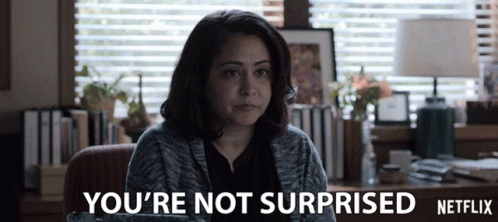 A Woman Sitting In Front Of A Window With The Words You 'Re Not Surprised Netflix GIF