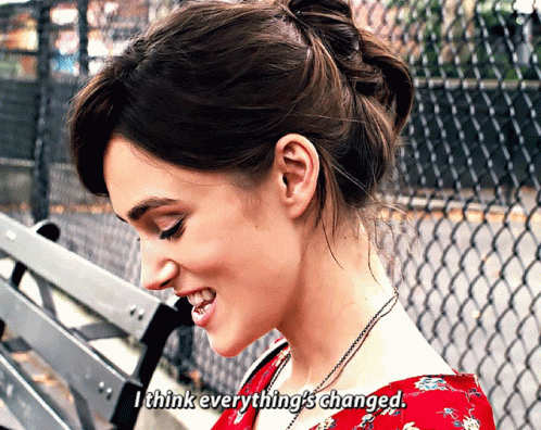 A Woman Sitting On A Bench With The Words " I Think Everything 'S Changed " Above Her GIF