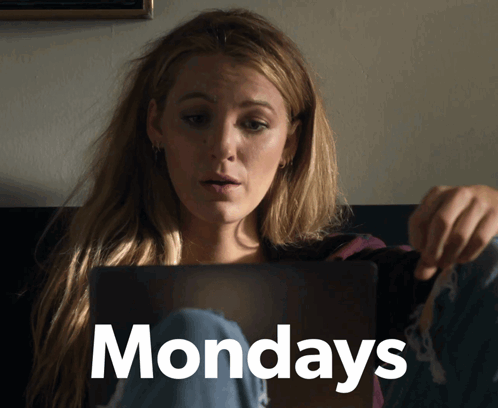 A Woman Sitting On A Couch Looking At A Laptop With The Word Mondays Written On The Bottom GIF