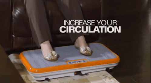 A Woman Sitting On A Couch With Her Feet On An Orange Device That Says Increase Your Circulation GIF