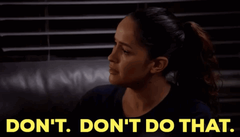 A Woman Sitting On A Couch With The Words " Do N't Do That " Written On The Bottom GIF