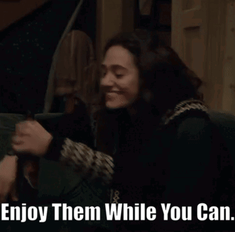 A Woman Sitting On A Couch With The Words Enjoy Them While You Can Written Below Her GIF