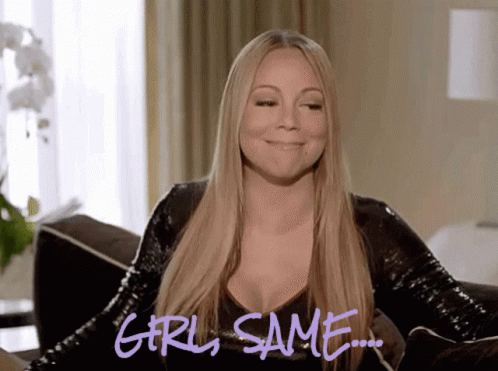 A Woman Sitting On A Couch With The Words Girl Same Written On The Bottom GIF