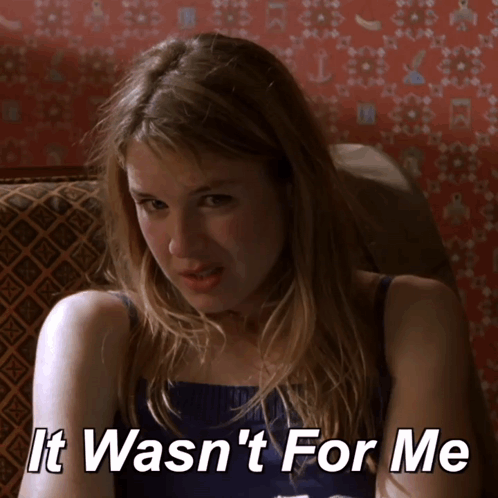 A Woman Sitting On A Couch With The Words " It Wasn 'T For Me " Written On The Bottom GIF