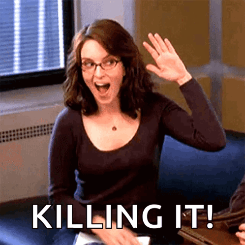 A Woman Sitting On A Couch With The Words Killing It Written Below Her GIF