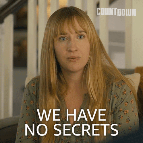 A Woman Sitting On A Couch With The Words We Have No Secrets Behind Her GIF