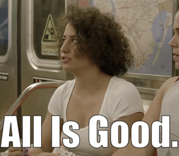 A Woman Sitting On A Train With The Words All Is Good Written On The Bottom GIF
