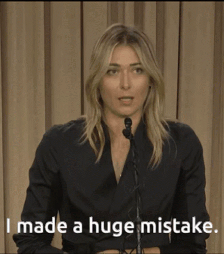A Woman Speaking Into A Microphone With The Words " I Made A Huge Mistake " Below Her GIF