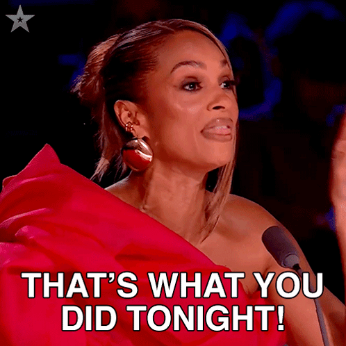 A Woman Speaking Into A Microphone With The Words That 'S What You Did Tonight Written Below Her GIF
