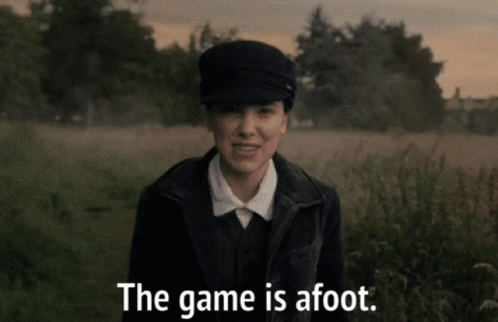 A Woman Standing In A Field With The Words The Game Is Afoot GIF