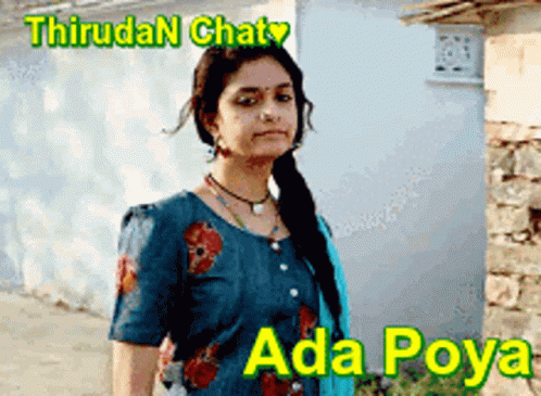 Woman Standing In Front Of Building With ThruDan Chaty Ada Poya GIF