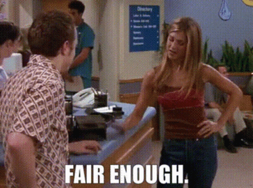 a woman standing in front of a counter with the words fair enough written on the bottom