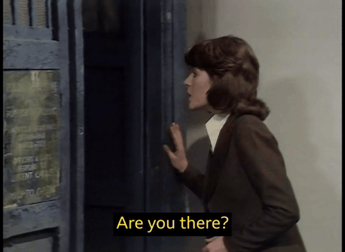a woman standing in front of a locker with the words are you there on the screen