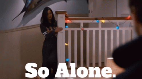 A Woman Standing In Front Of A Railing With The Words So Alone GIF