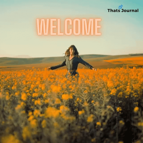 A Woman Stands In A Field Of Yellow Flowers With The Words Welcome Written Above Her GIF