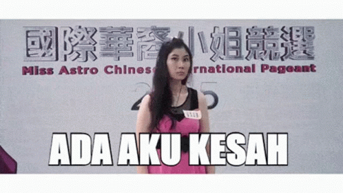 Woman In Front Of Miss Astro Pageant GIF