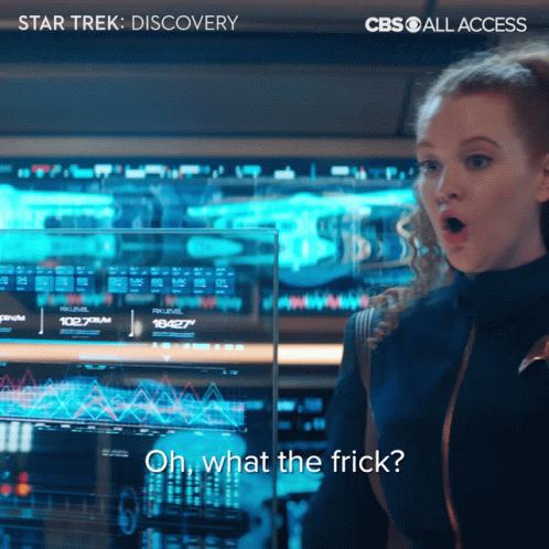 A Woman Stands In Front Of A Screen That Says Oh What The Frick On It GIF