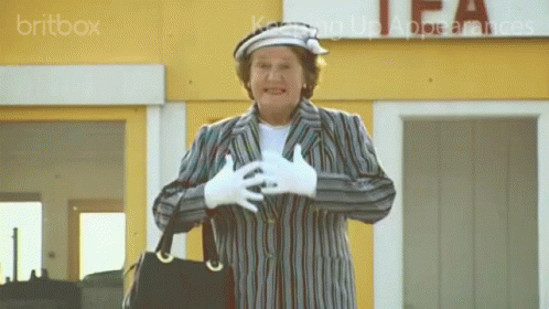 A Woman Stands In Front Of A Tea Store GIF