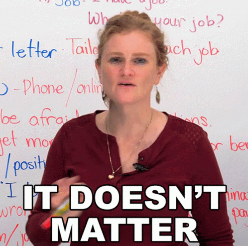 A Woman Stands In Front Of A White Board With The Words It Does N't Matter Written On It GIF