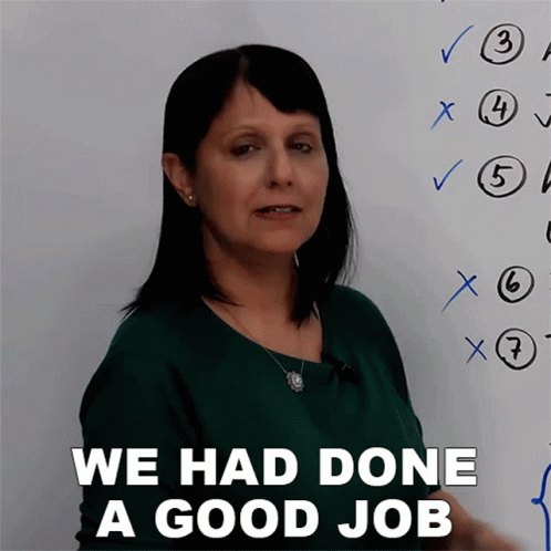 A Woman Stands In Front Of A White Board With The Words We Had Done A Good Job Written On It GIF