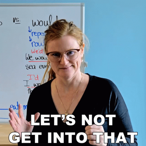 A Woman Stands In Front Of A Whiteboard With The Words Let 'S Not Get Into That Written On It GIF