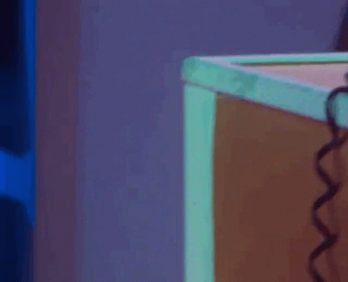 A Woman Stands In Front Of An Emergency Exit Door GIF