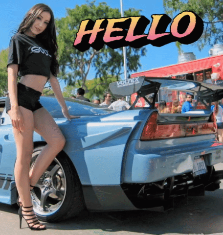 A Woman Stands Next To A Blue Sports Car With The Word Hello Above Her GIF