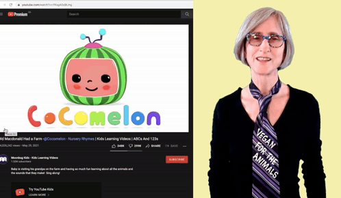 a woman stands next to a cocomelon video