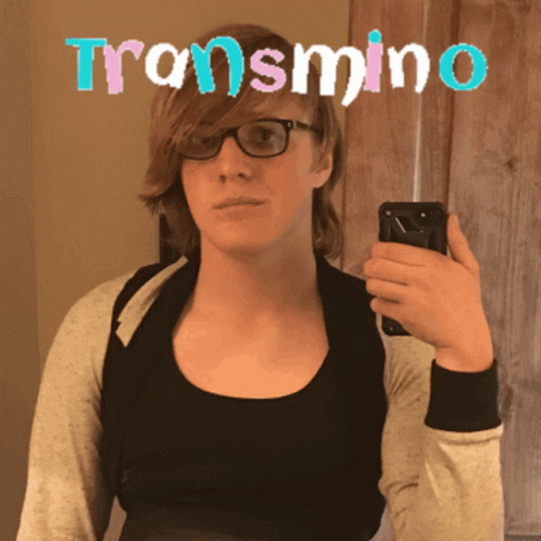 A Woman Taking A Picture Of Herself With The Word Transmin On The Top GIF