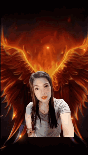A Woman Taking A Selfie In Front Of A Painting Of A Phoenix GIF