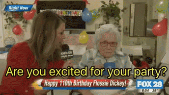 A Woman Talking Into A Microphone With The Words " Are You Excited For Your Party " Above Her GIF
