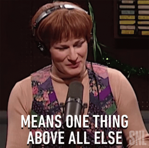 Woman Talking Into Microphone With Means One Thing GIF