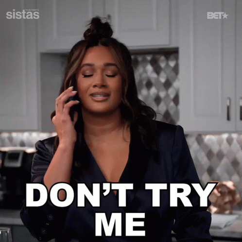 A Woman Talking On A Cell Phone With The Words " Do N't Try Me " Behind Her GIF