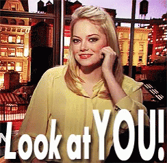 A Woman Talking On A Cell Phone With The Words " Look At You " Written Below Her GIF