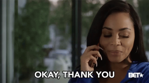A Woman Talking On A Cell Phone With The Words Okay Thank You Behind Her GIF